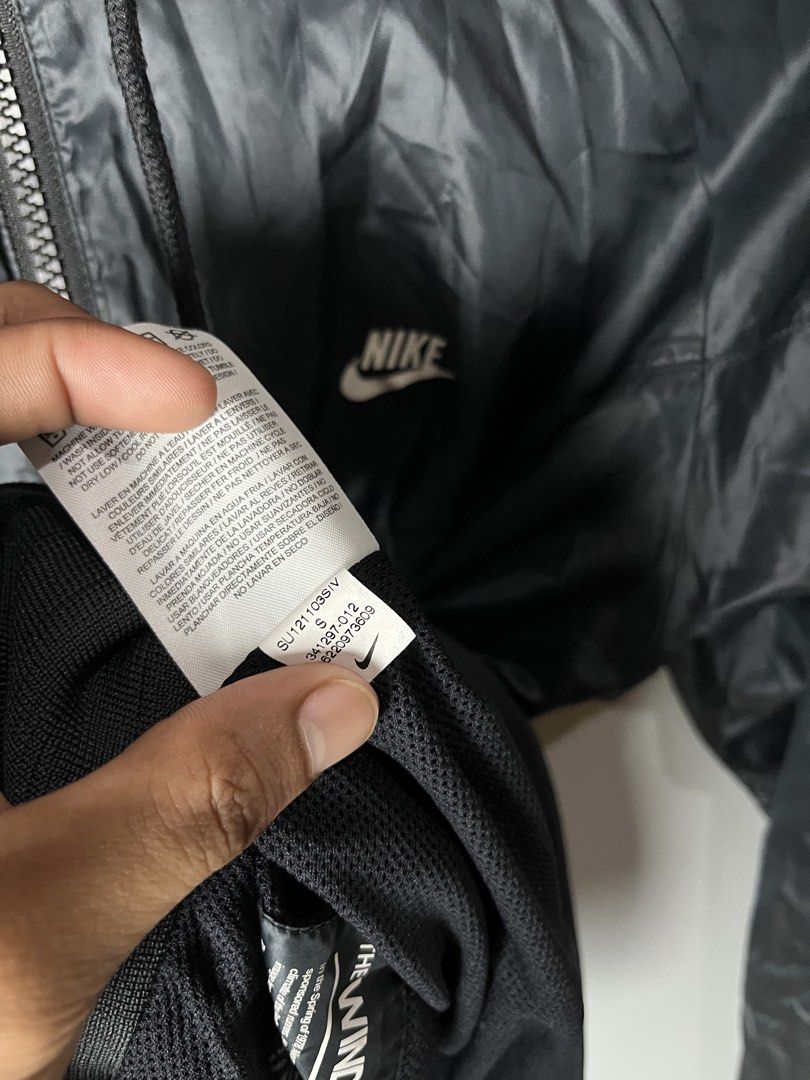 Nike Sportswear The Windrunner Jacket Black Size S (Category: Coats, Jackets and Outerwear) located in Dagupan City. Submitted by loves2thrifth (Listing ID 1470422549, Image 2). Description: - Brand: Nike Sportswear - Item: The Windrunner Jacket - Color: Classic Black - Size: Small - Condition: Excellent / Pre-loved (as applicable) - Design: Iconic chevron chest panel, hooded with full zip front - Storage: Secure zippered side pockets - Fit: Snug
