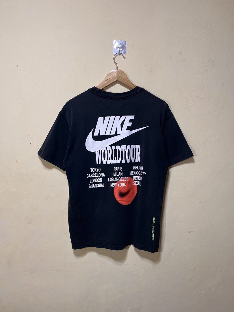 Nike World Tour in Deep Blue Tshirt (Category: Activewear) located in Naga. Submitted by davinci_25 (Listing ID 1470441390, Image 1). Description: dimes: 20 width x 27 length issue: none condition: excellent condition (9.5/10) color rate: 9.5/10.
