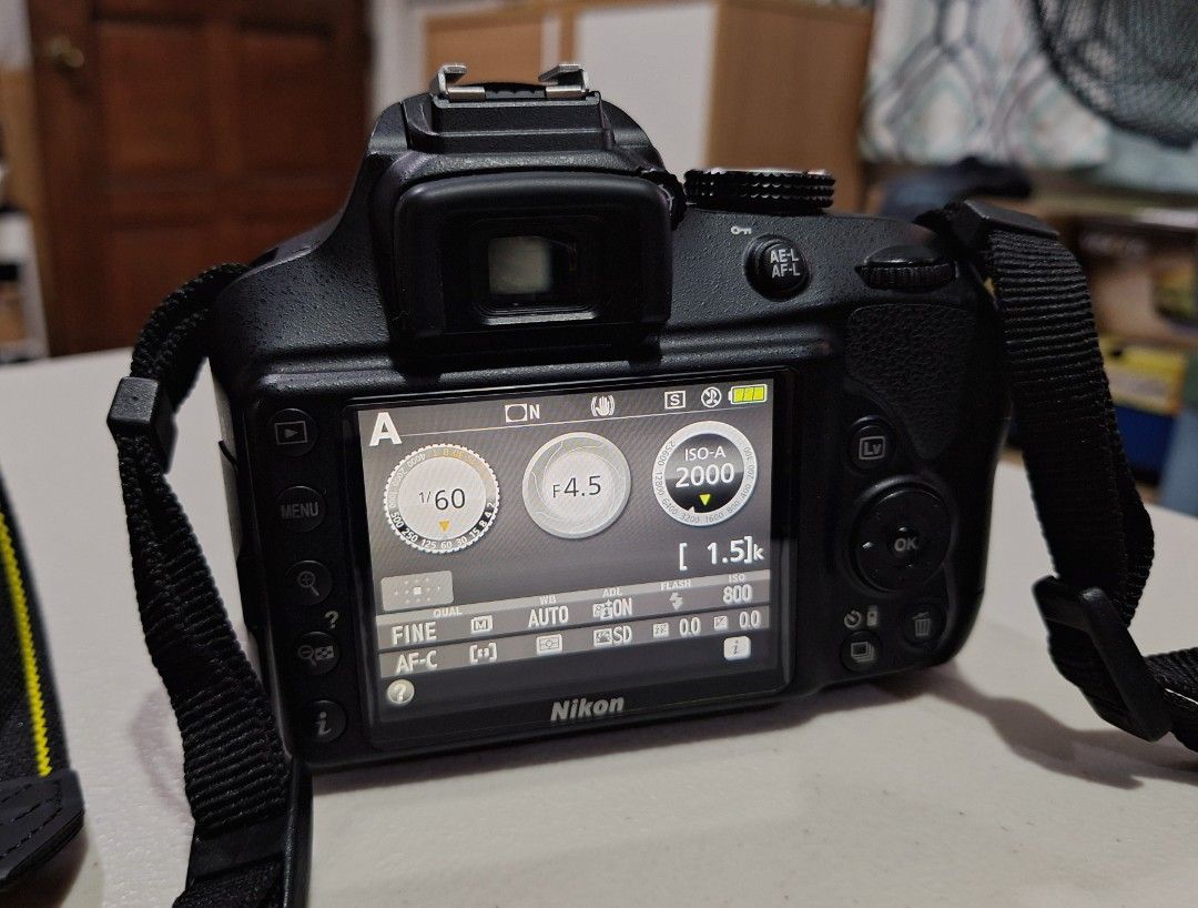 Nikon D3400 DSLR Camera with 18-55mm VR Kit (Category: Cameras) located in Davao. Submitted by nadrev18525 (Listing ID 1470495916, Image 3). Description: - Nikon D3400 DSLR camera body in very excellent, clean condition, no scratches. - AF-P DX NIKKOR 18-55mm f/3.5-5.6G VR lens. - Complete with original box, user manual, MH-24 battery charger, and Li-ion battery - Includes official Nikon neck strap, 16GB Sd Card, and a complimentary branded camer