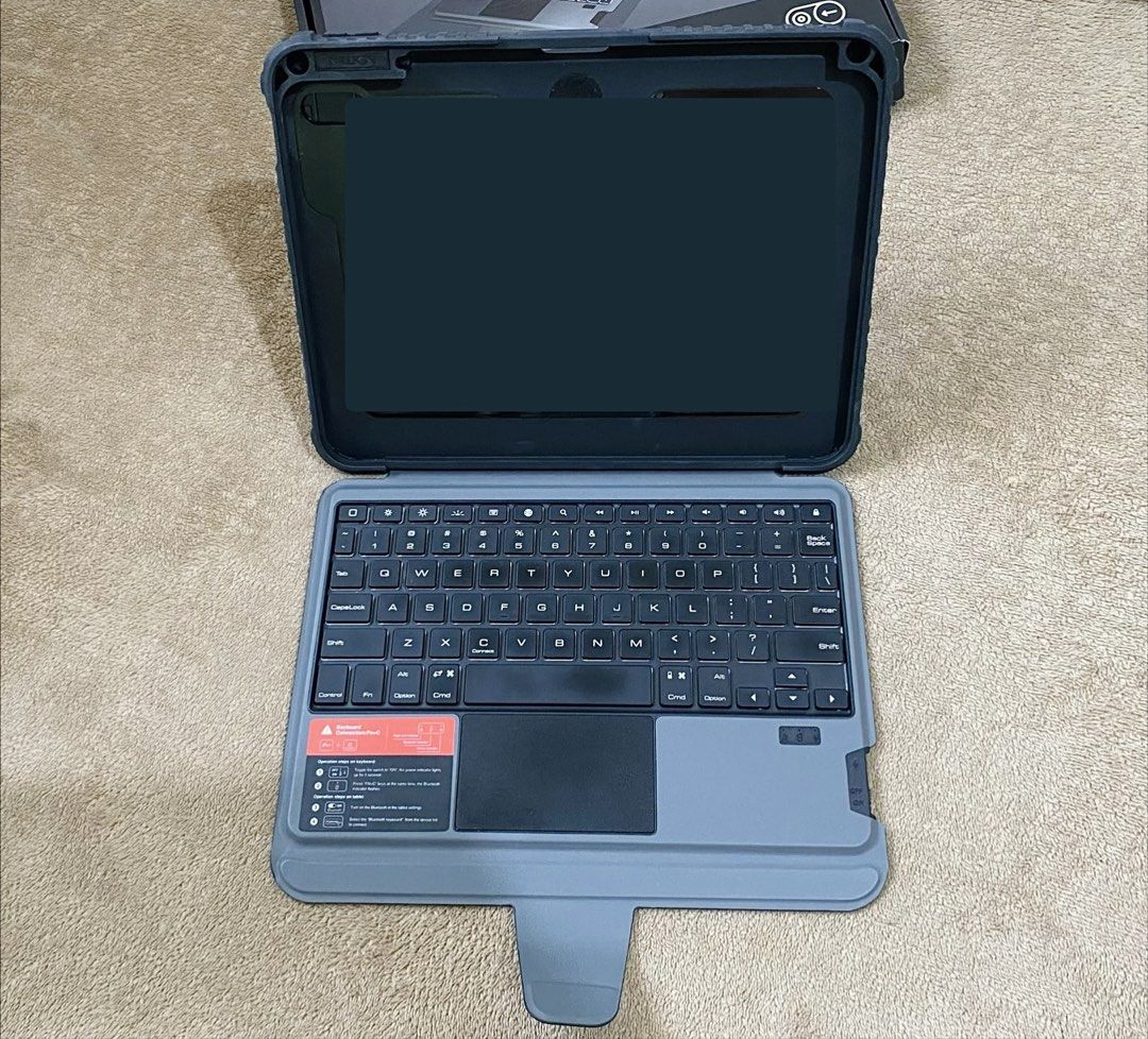 Nillkin Combo Keyboard Case (Category: Computer Keyboard) located in San Juan City. Submitted by selaina (Listing ID 1470418271, Image 1). Description: - Fits iPad 11-inch A16 - Detachable Keyboard - Case with stand - Sliding camera cover - Backlit keyboard - complete with box and charger cable.