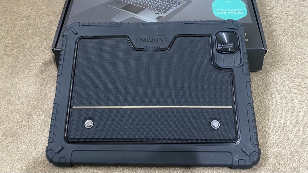 Nillkin Combo Keyboard Case (Category: Computer Keyboard) located in San Juan City. Submitted by selaina (Listing ID 1470418271, Image 3). Description: - Fits iPad 11-inch A16 - Detachable Keyboard - Case with stand - Sliding camera cover - Backlit keyboard - complete with box and charger cable.