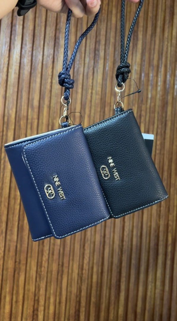 Nine West Wallet (Category: Wallets & Card holders) located in Cabanatuan. Submitted by hellorhea (Listing ID 1470451516, Image 1). Description: Brand new Nine west wallet in blue and black color. .