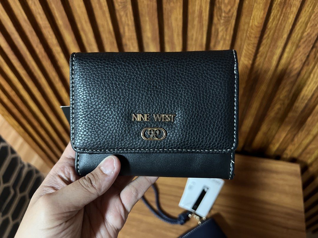 Nine West Wallet (Category: Wallets & Card holders) located in Cabanatuan. Submitted by hellorhea (Listing ID 1470451516, Image 3). Description: Brand new Nine west wallet in blue and black color. .