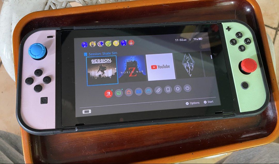 Nintendo Switch Console with Case and Accessories (Category: Nintendo) located in Baguio. Submitted by bruddafunk420 (Listing ID 1470499914, Image 1). Description: - Nintendo Switch console with cute pastel pink and green Joy-Cons - Screen is fully functional and powers on normally - Minor, normal wear on the back housing and screen from regular use - Includes black MEO protective grip case and teal carrying case - Comes with portable dock adapte