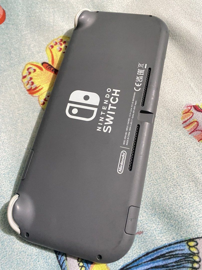 Nintendo Switch Lite Grey (Category: Nintendo) located in General Trias. Submitted by eddd14 (Listing ID 1470504417, Image 3). Description: For Sale Nintendo Switch Lite Gray No issue, No dents ✨ Nintendo Switch Lite Original Charger Pokemon Steelcase Tempered Glass 2 Physical Games Cartridge: - Assassins Creed Rebel Collection (2in1 Game) - Trials of Mana Price: ₱7,000 (fixed price) Location: General Trias, Cavite.