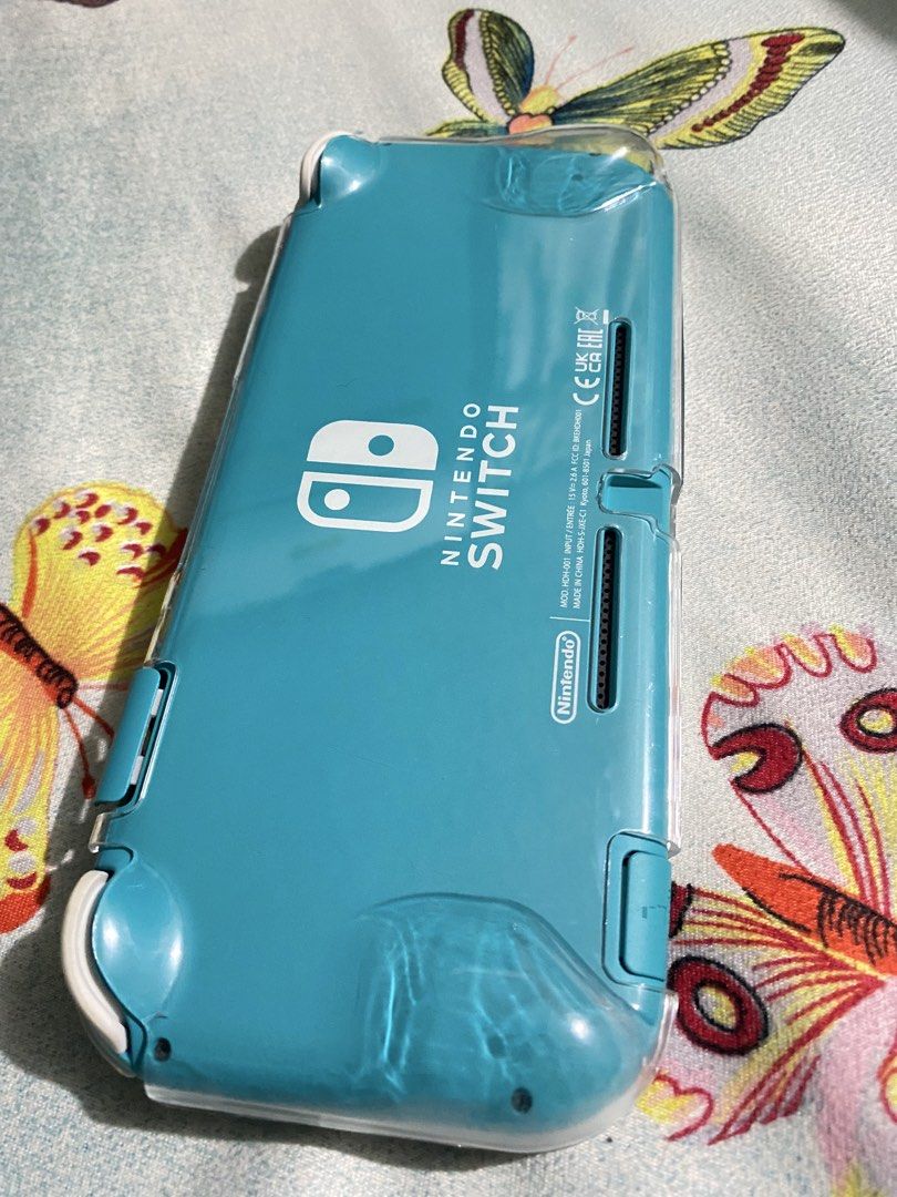 Nintendo Switch Lite Turquoise (Category: Nintendo) located in General Trias. Submitted by eddd14 (Listing ID 1470504771, Image 3). Description: For Sale Nintendo Switch Lite Turquoise No Issue, No dents Like New ✨ Nintendo Switch Lite Original Charger Storage Carrying Case Joystick Thumb Grip Protective Case Dobe Wireless Controller (Like New) Price: ₱7,000 (fixed price) Location: General Trias, Cavite.