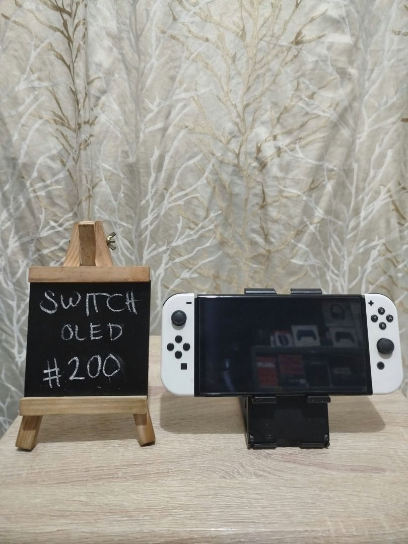 Nintendo Switch OLED mura lng! (Category: Nintendo) located in Paranaque City. Submitted by thebiskwitcompany (Listing ID 1470360844, Image 2). Description: #200 Nintendo Switch Oled P10495 -Unit, Charger, Joycons, Joycon Strap, Joycon Grip, Dock, HMDI -No Issue (buttons, analog, eshop, micro sd card reader, wifi etc) -with tempered glass since day 1 -very good condition! Shipping through Lalamove, Grab, JNT, LBC (COD/COP) Pickup @ 4th Estate Par