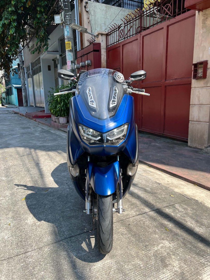 Nmax V2 2021 (Category: Motorbikes for Sale) located in Manila. Submitted by jissale (Listing ID 1470360086, Image 2). Description: WALA NA PARKINGAN BENTA NALANG🥲 NMAX V2 2021 NON ABS Price: 85K NALANG‼️ Original OR CR Open Dos Unregistered aug 2026 May plaka from LTO Color indicated White bolts 80% BomX Mags with Big Disc Rcb caliber lever Clear visor Mt8 pipe Makapal mga gulong Rcb Shock Brb radiator Makinis fairings NO ISSUE NO ISSUE Locatio