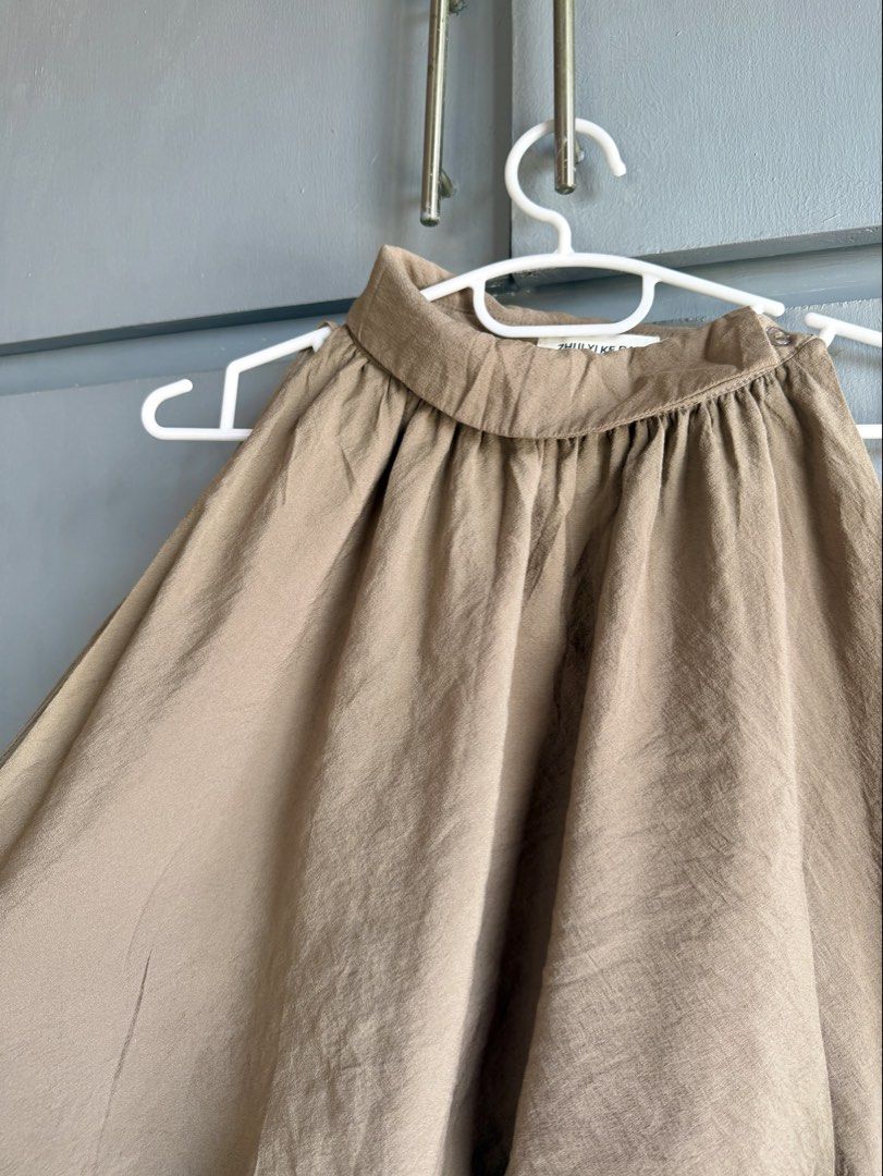 Nude/Beige Bubble Hem Halter Top (Category: Sleeveless) located in San Juan City. Submitted by itemsfromkam (Listing ID 1470454911, Image 3). Description: • L on tag, fits S-semi L • unique style, has inner lining, vv cute! • great for dinners and night outs • actual ww at the end.