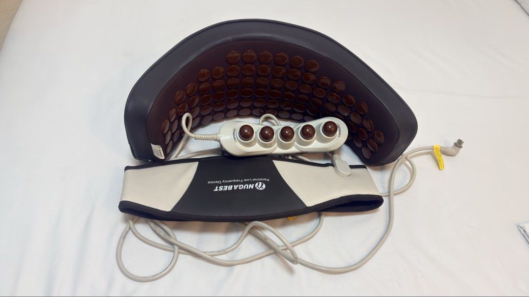 Nuga Best Thermal Massage Bed with Accessories (Category: Massage Devices) located in Santa Rosa. Submitted by sprutus (Listing ID 1470464135, Image 3). Description: - Authentic Nuga Best thermal massage bed in brown and white - Includes tourmaline stone mats, handheld massagers, and low frequency device - Comes with standing unit, all cables, and remotes - Fully adjustable setup in great working condition - Clean upholstery throughout - Note: He