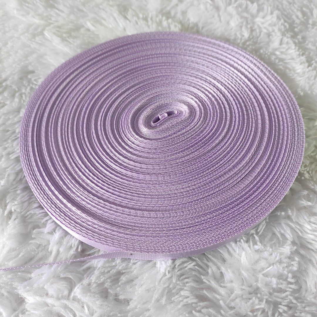 Nylon Webbing Strap 5/8 (Category: Craft Supplies & Tools) located in Cainta. Submitted by fukunekojapansurplus (Listing ID 1470367194, Image 1). Description: 150 pesos Nylon Webbing Strap For crafts, bags, diy repair Lavender More or less 40 meters. Brand new.