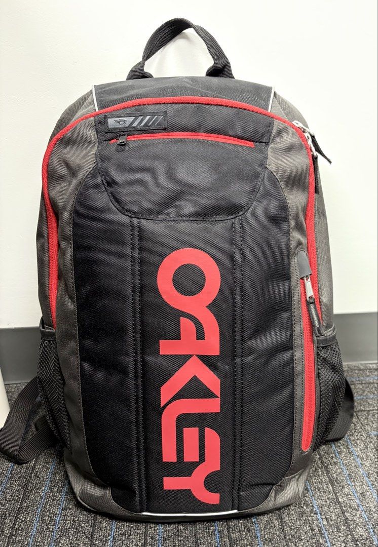 Oakley Enduro 20L 3.0 Backpack Forged Iron Redline (Category: Backpacks) located in Pasig City. Submitted by rtstarroza (Listing ID 1470506237, Image 2). Description: *** RUSH SALE! NO SWAPS! *** PICK UP AT URBAN DECA ORTIGAS *** PLEASE CHECK MY OTHER ITEMS! - Brand: Oakley - Model: Enduro 20L 3.0 (Model 9Q7) - Colorway: Forged Iron with Redline accents - Condition: Like New with original hang tag - Capacity: 20 Liters, perfect for daily use - Fe