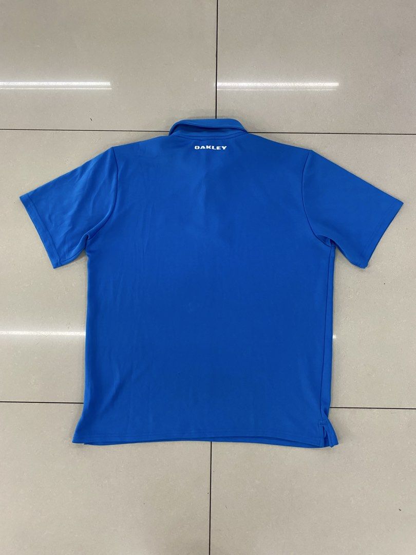 Oakley Polo (Category: Formal Shirts) located in Quezon City. Submitted by janrey0402 (Listing ID 1470407976, Image 3). Description: Size Medium to Large Dimensions 22 Width x 27.5 Length Authentic Complete Tags Excellent Condition Color Rate 9.5/10 Ready to Wear No Isssue.