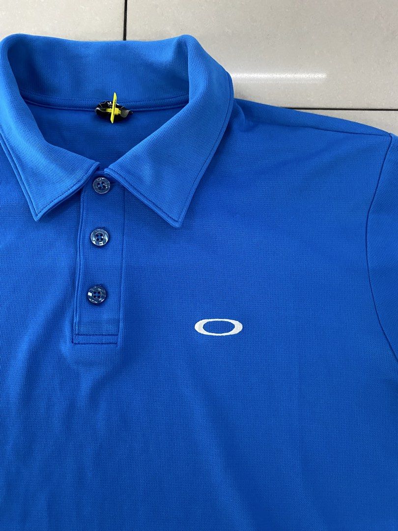 Oakley Polo (Category: Formal Shirts) located in Quezon City. Submitted by janrey0402 (Listing ID 1470407976, Image 2). Description: Size Medium to Large Dimensions 22 Width x 27.5 Length Authentic Complete Tags Excellent Condition Color Rate 9.5/10 Ready to Wear No Isssue.