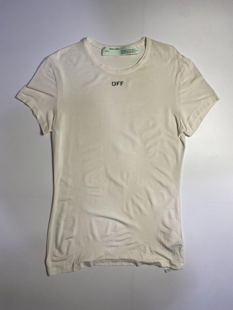 Off White logo stamp fitted T-shirt (Category: Others Tops) located in Manila. Submitted by streetw1se.ph (Listing ID 1470540319, Image 1). Description: Off White fitted T-shirt fow womens Width:17 Length:26 Shoulder:15 Sleeve length:6 Hem:16 (Measured in inches) -Hairline/print chip flaw -Still good condition -Perfect for outdoor activities -Made in Italy -100% authentic .