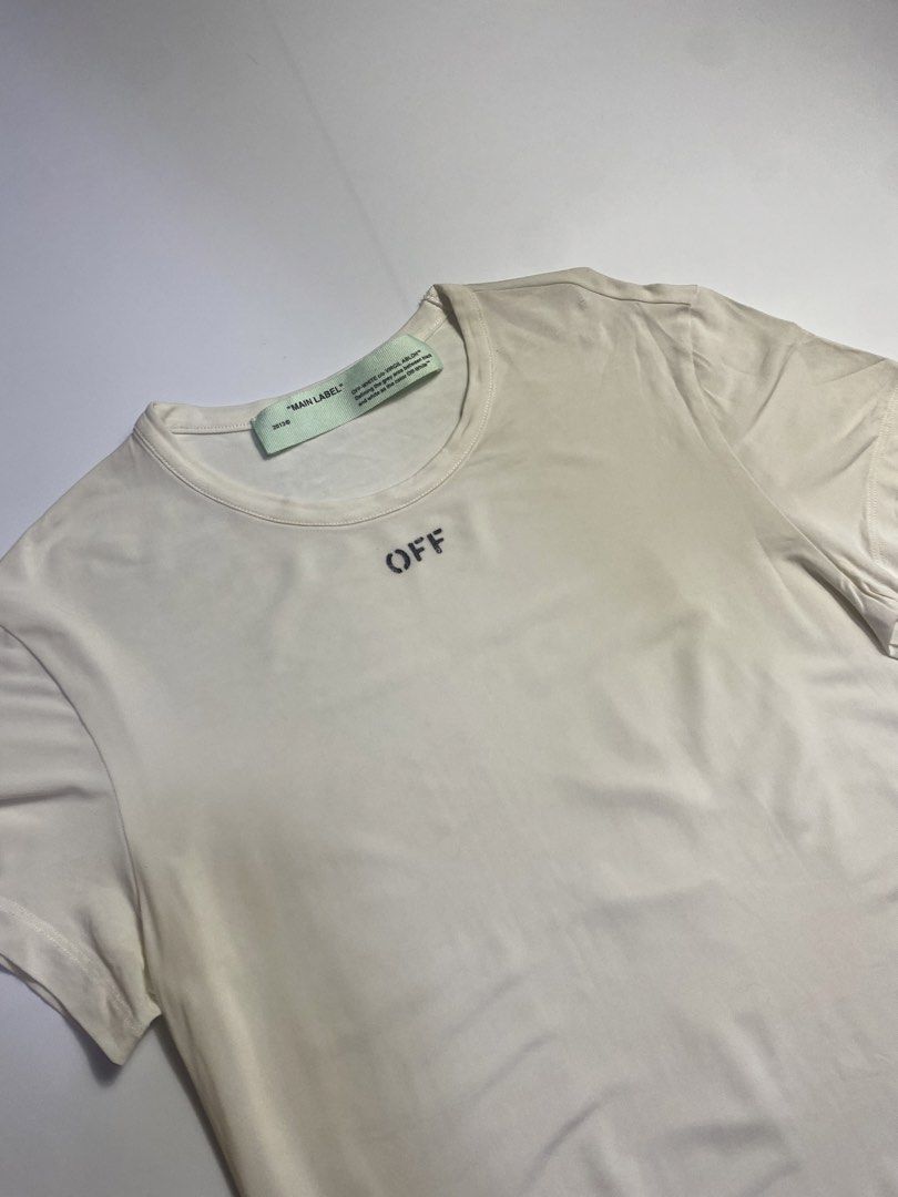Off White logo stamp fitted T-shirt (Category: Others Tops) located in Manila. Submitted by streetw1se.ph (Listing ID 1470540319, Image 2). Description: Off White fitted T-shirt fow womens Width:17 Length:26 Shoulder:15 Sleeve length:6 Hem:16 (Measured in inches) -Hairline/print chip flaw -Still good condition -Perfect for outdoor activities -Made in Italy -100% authentic .