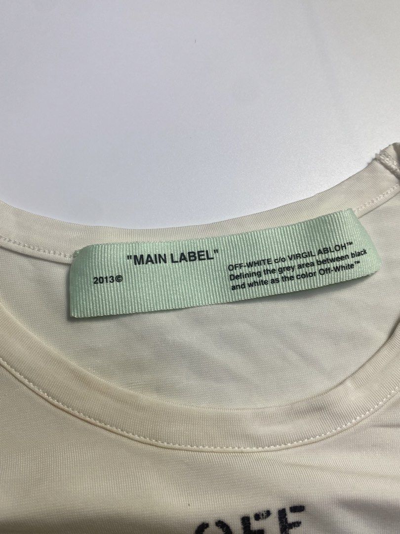 Off White logo stamp fitted T-shirt (Category: Others Tops) located in Manila. Submitted by streetw1se.ph (Listing ID 1470540319, Image 3). Description: Off White fitted T-shirt fow womens Width:17 Length:26 Shoulder:15 Sleeve length:6 Hem:16 (Measured in inches) -Hairline/print chip flaw -Still good condition -Perfect for outdoor activities -Made in Italy -100% authentic .