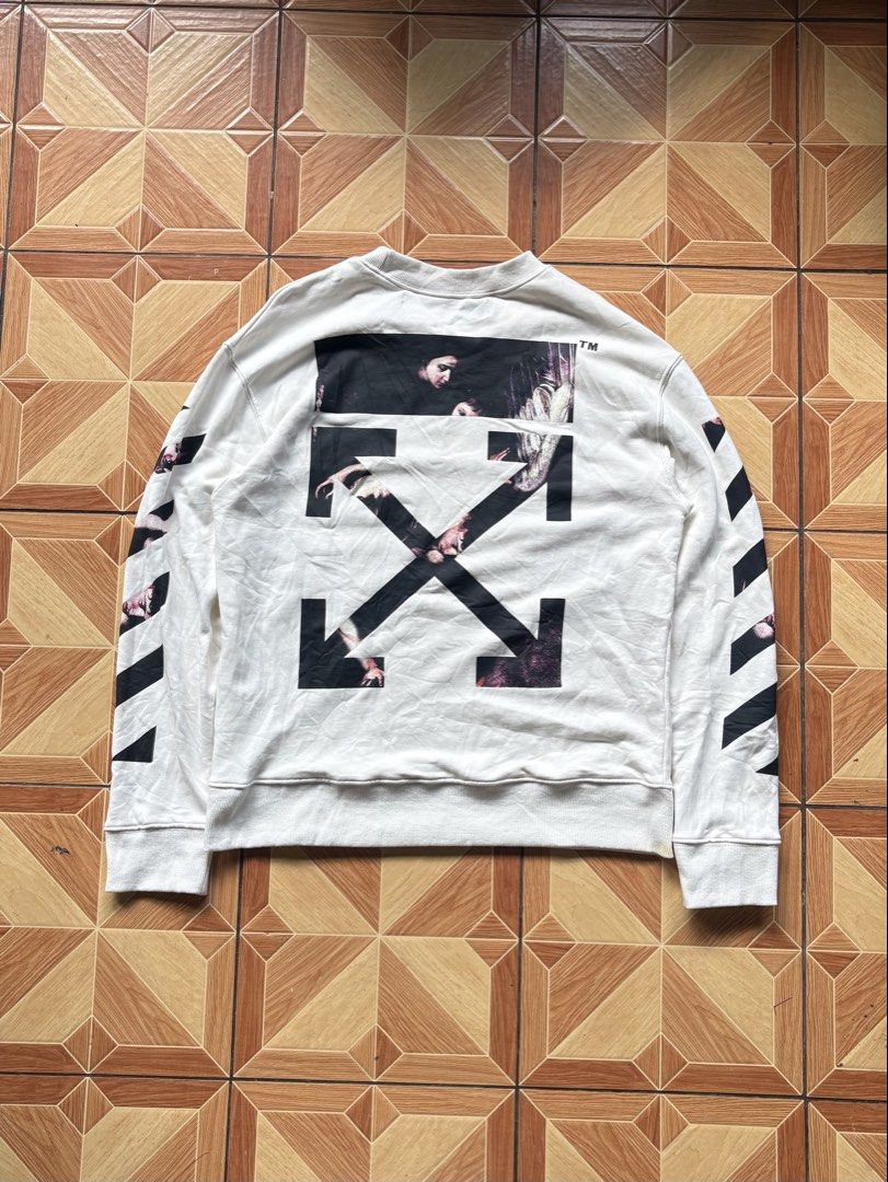 Off-White Caravaggio Arrow Print White Sweatshirt (Category: Coats, Jackets and Outerwear) located in Baybay. Submitted by jhondhelbe76855 (Listing ID 1470369786, Image 3). Description: Off-White Size:large on tag Dimes:21.5x27 Color rate:9 Need to wash No Issue Excellent condition 📩📩📩 Unlivouch Visayalocation.