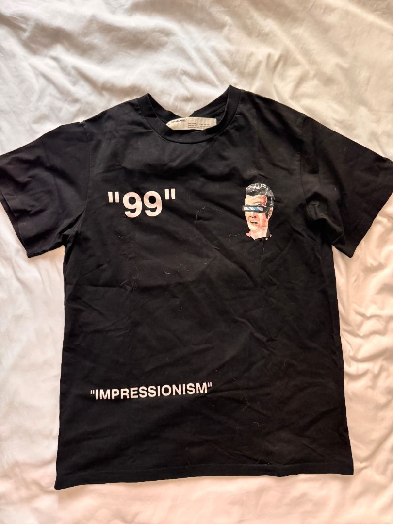 Off-White Impressionism '99 Black T-Shirt M (Category: Shirts) located in Cebu City. Submitted by _t.rix (Listing ID 1470373936, Image 1). Description: - Authentic Off-White short sleeve tee from the Impressionism collection - Color: Black - Features '99' print and graphic on the chest - Large eye-catching graphic and text on the back - Classic crew neck style with a regular fit - Made in Portugal - Interior wash tags and main label intact.