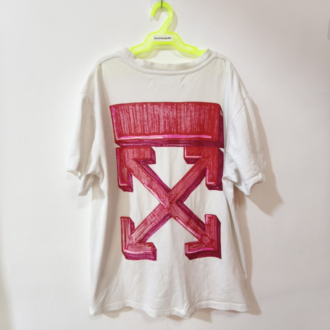 Off-White Marker Arrows Tee White Size XS (Category: Tshirts & Polo Shirts ) located in Quezon City. Submitted by inrelationthrift (Listing ID 1470432849, Image 1). Description: - Brand: Off-White - Color: White with black front logo and red marker arrows on the back - Size: Extra Small (XS) but fit L-XL - Material: 100% premium cotton - Fit: Regular crew neck cut - Condition: Excellent (ready to wear) - Style: Casual streetwear staple, very easy
