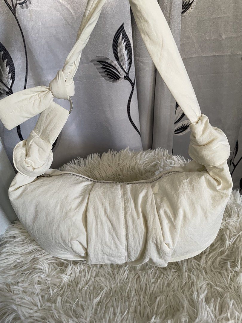 Offwhite Puffy Croissant Crossbody Bag (Category: Cross-body Bags) located in Cabanatuan. Submitted by moraiahraven (Listing ID 1470488760, Image 3). Description: .