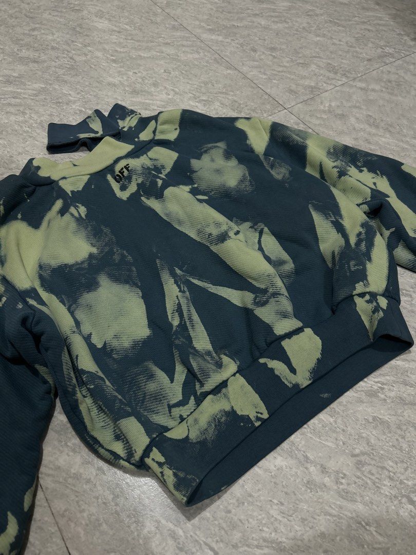 Off-White Tie-Dye Mock Neck Sweatshirt (Category: Longsleeves) located in Manila. Submitted by tanieel (Listing ID 1470461770, Image 2). Description: - Brand: Off-White - Style: Tie-dye sweatshirt in blue and green - Neckline: Mock neck with small 'OFF' print - Details: Long sleeves, ribbed cuffs and hem - Interior: Soft French terry lining - Condition: Brand new with main label tag attached via plastic fastener.