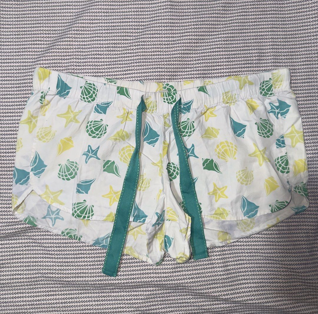 Old Navy Shell Pattern Drawstring Shorts Size M (Category: Shorts) located in Santa Ana. Submitted by fatikilla (Listing ID 1470464630, Image 1). Description: - Design: Colorful all-over shell and starfish print on white - Features: Super lightweight, comfortable, elastic waistband with green drawstring - Perfect for: Summer days, lounging, or sleeping in.