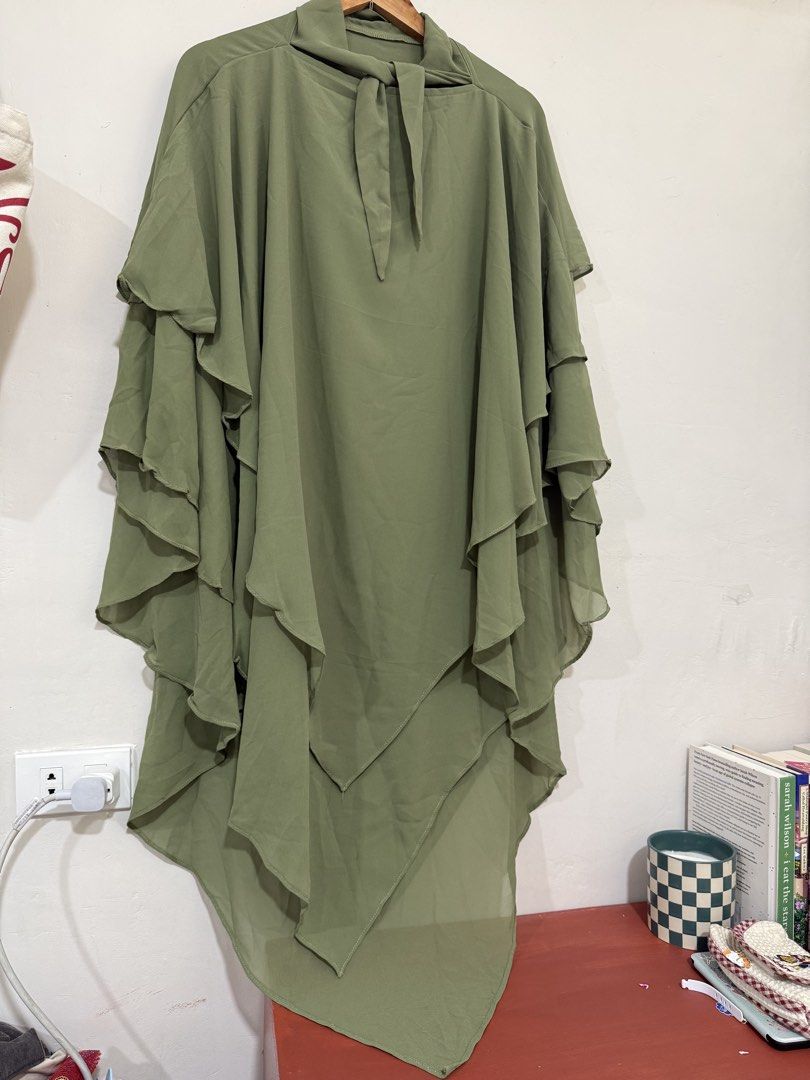 Olive green cover up shawl (Category: Coats, Jackets and Outerwear) located in Manila. Submitted by morningthrifters (Listing ID 1470477458, Image 3). Description: 📝This garment is a multi-layered chiffon (an elegant, flowy head and upper-body covering designed for modest dress), which can be worn beautifully as an overlay with simple abayas, inner slip dresses, or formal evening gowns. 📐Free size 💗 Second time buyers has a free item, follow m