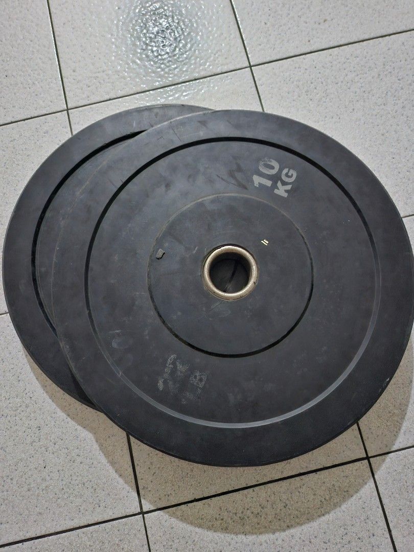 Olympic bumper plates (Category: Weights & Dumbbells) located in Makati City. Submitted by rico_bear (Listing ID 1470454919, Image 3). Description: take all olympic bumper plates. pair of 25kg, 20kg, 10kg and 5kg. free bumper plate rack and 7ft 20kg olympic barbell. barbell is rusty. not using anymore..