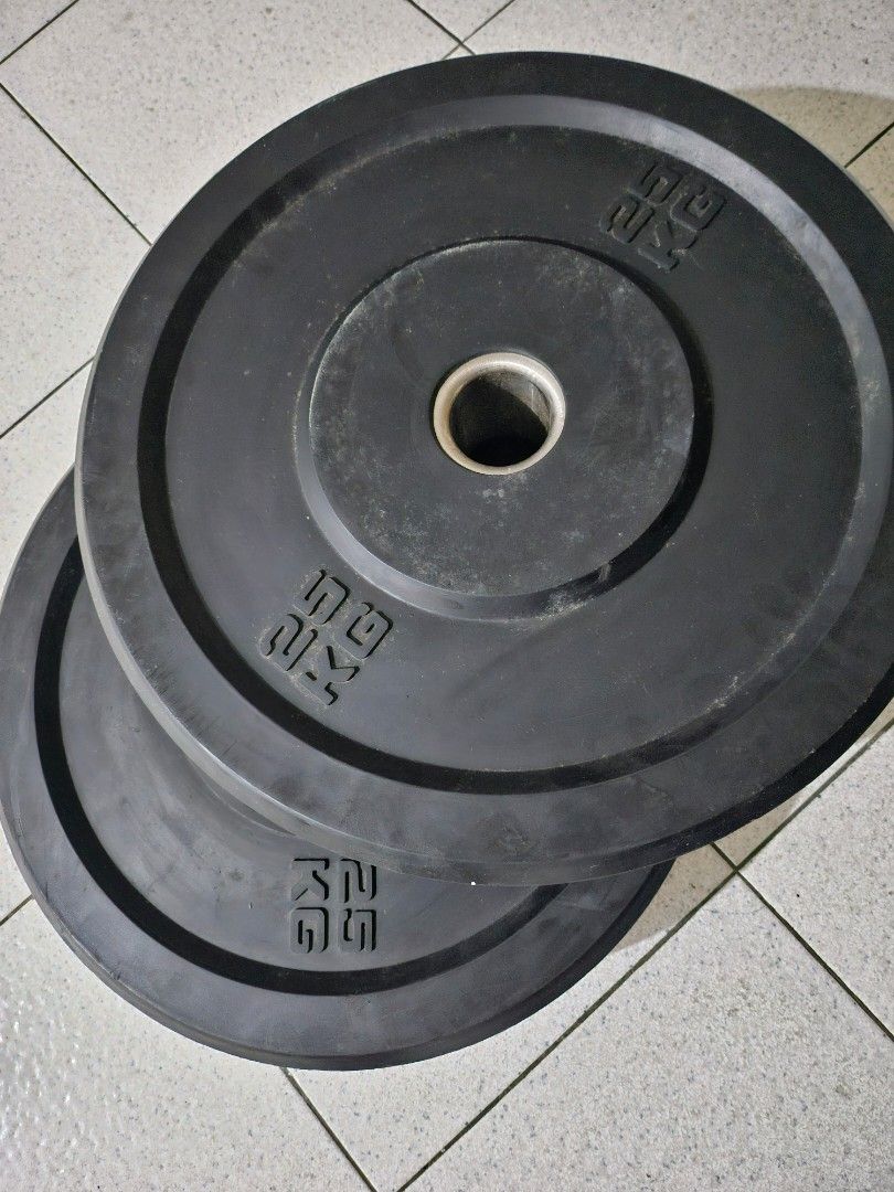 Olympic bumper plates (Category: Weights & Dumbbells) located in Makati City. Submitted by rico_bear (Listing ID 1470454919, Image 1). Description: take all olympic bumper plates. pair of 25kg, 20kg, 10kg and 5kg. free bumper plate rack and 7ft 20kg olympic barbell. barbell is rusty. not using anymore..