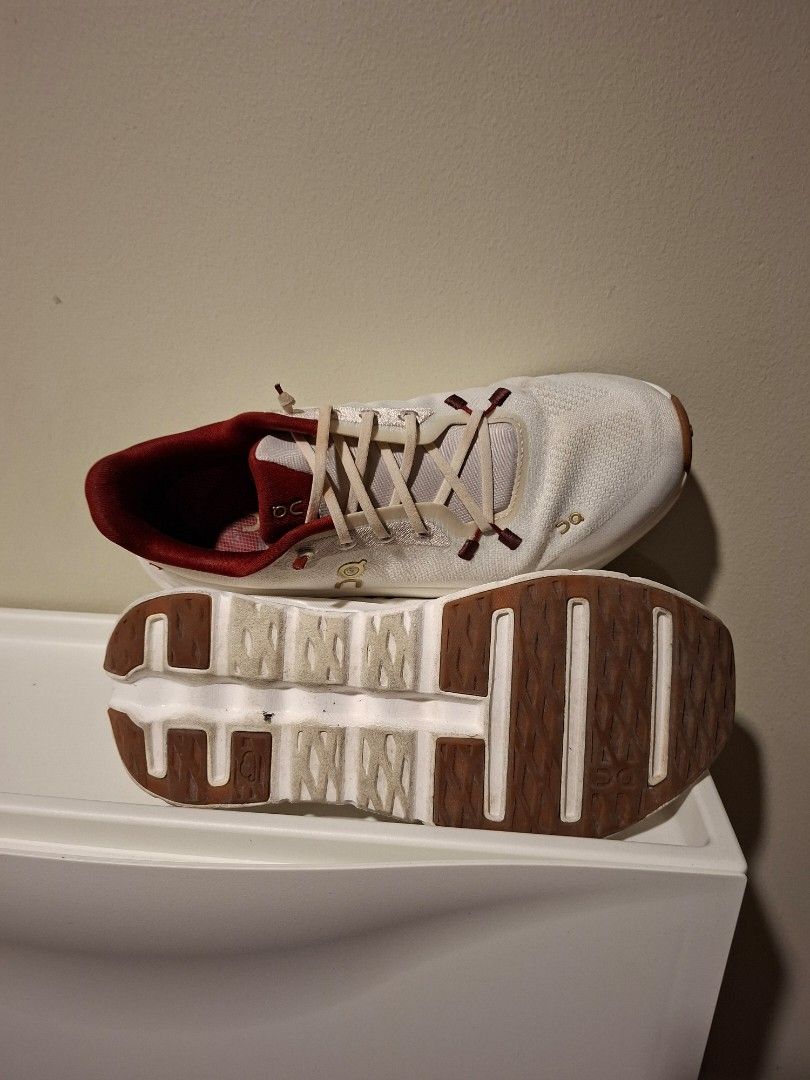 On Running Cloudtilt Sneakers (Category: Sneakers) located in Manila. Submitted by olxph_181341877 (Listing ID 1470353159, Image 3). Description: - SPECIAL OFFER P15K FOR 2 PAIRS Brand: On Running Cloudtilt - Quantity: 2 pairs available - Colorway 1: Pearl ivory with maroon accents (Year of the Snake collection) - Colorway 2: Bronze brown and black - Features: Lightweight mesh upper and cushioned sole with CloudTec Phase technology - Condition: S