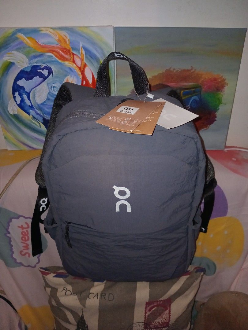 On Running Waist Pack 2L Lite Grey Backpack (Category: Belt bags, Clutches and Pouches) located in Rodriguez. Submitted by maycol (Listing ID 1470369741, Image 3). Description: - Brand: On Running - Model: Waist Pack 2L Lite - Color: Grey with white On logo on front and strap ends - Condition: Brand new with original paper tags attached - Comfort & Fit: Breathable mesh back panel with adjustable straps - Storage: Convenient zippered front pocket 