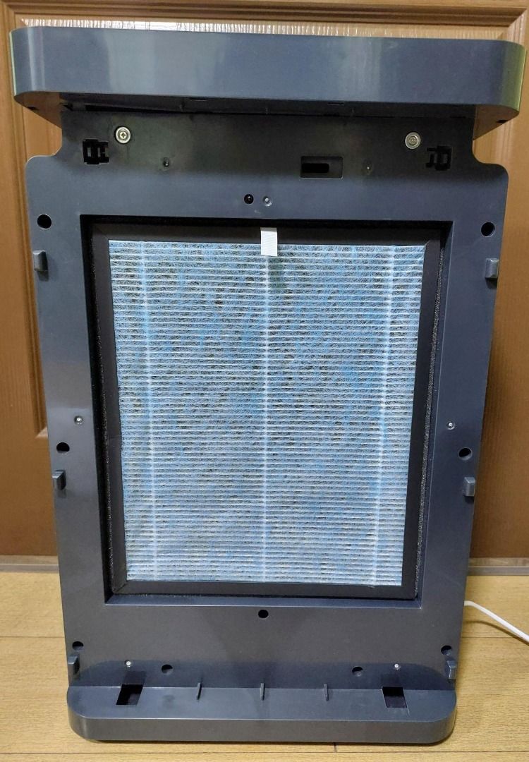 ONE-HOME Air Purifier (K15 Ultra) (Category: Air Purifiers & Dehumidifiers) located in Pasig City. Submitted by keithra (Listing ID 1470546542, Image 3). Description: - Brand: ONE-HOME - Color: White body with dark gray top and accents - Display: Digital control panel showing PM2.5 levels, temperature, fan speed, and mode - Controls: Touch buttons for power, speed, timer, sterilization, and anion - Design: Front slatted intake grille, side handle