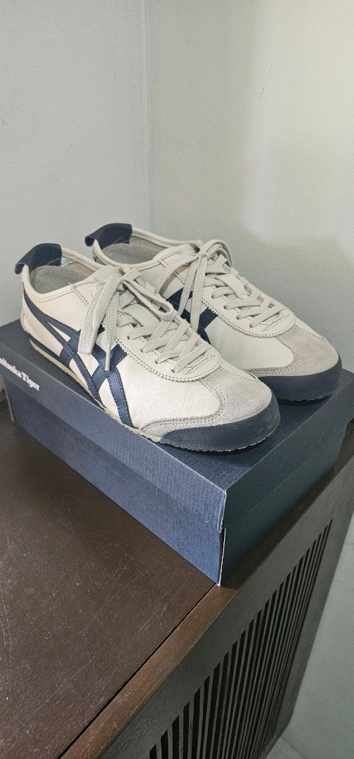 Onitsuka Tiger Mexico 66 (Category: Casual Shoes) located in Manila. Submitted by jv.ln (Listing ID 1470356708, Image 1). Description: - Brand: Onitsuka Tiger Mexico 66 - Colorway: Birch and Peacoat with signature side stripes - Size: US 9 / EUR 42.5 - Inclusions: Original box and tissue paper included.