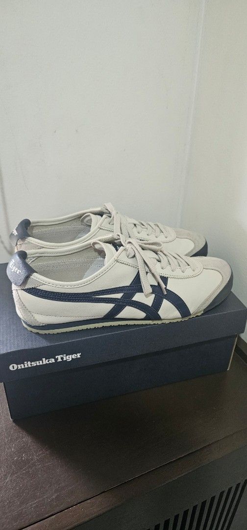 Onitsuka Tiger Mexico 66 (Category: Casual Shoes) located in Manila. Submitted by jv.ln (Listing ID 1470356708, Image 2). Description: - Brand: Onitsuka Tiger Mexico 66 - Colorway: Birch and Peacoat with signature side stripes - Size: US 9 / EUR 42.5 - Inclusions: Original box and tissue paper included.