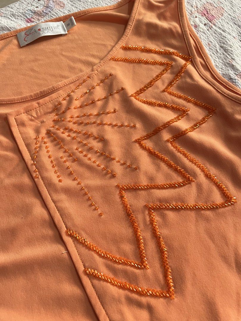 Orange Beaded Top (Category: Sleeveless) located in Cabanatuan. Submitted by winx_closeth (Listing ID 1470426943, Image 2). Description: Missing beads.