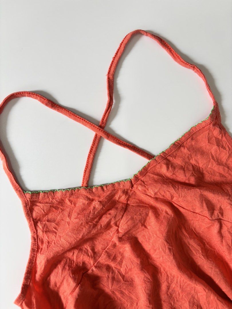 Orange with green lining criss cross top (Category: Sleeveless) located in Binan City. Submitted by byhiraeth (Listing ID 1470478135, Image 3). Description: -small to medium -no ww -will only entertain offers since IM out of reply quota -loc is santa rosa, laguna.