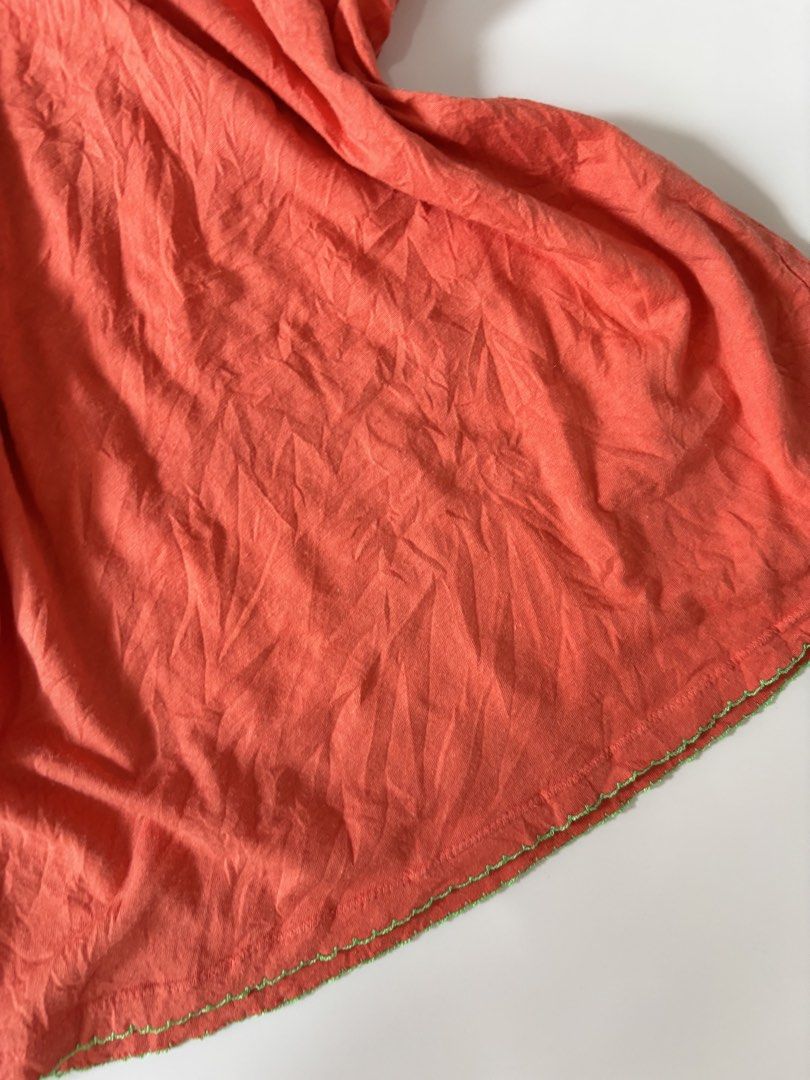 Orange with green lining criss cross top (Category: Sleeveless) located in Binan City. Submitted by byhiraeth (Listing ID 1470478135, Image 2). Description: -small to medium -no ww -will only entertain offers since IM out of reply quota -loc is santa rosa, laguna.