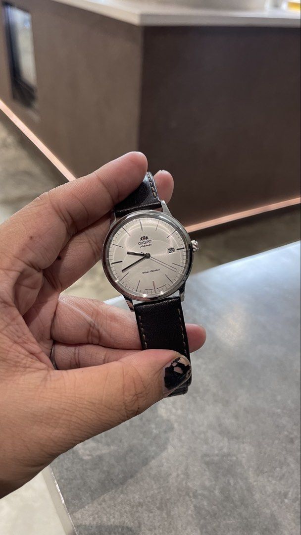 Orient Bambino Gen 2 V3 White Dial Brown Strap (Category: Men's Watches) located in Cebu City. Submitted by redd_or_yellow (Listing ID 1470531501, Image 3). Description: Orient Bambino Gen 2 V3 FACOOOOEWO ACO00OEW White Dial Minimalist 40.5 mm with Brown Strap. Comes with Box and Card Add ons: Black Aftermarket Leather Strap.