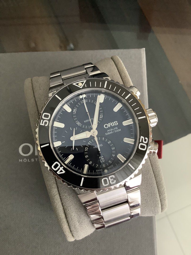 ORIS AQUIS Chronograph Automatic 45.5mm Watch (Category: Luxury Watches) located in Taytay. Submitted by eugeneyoung (Listing ID 1470401881, Image 1). Description: ✅ Ref.model# 01.774.7743.4155-07 8 24 05PEB. ✅ 45.5mm. Case size. ✅ Automatic Oris Caliber 774 Winding Movement. ✅ 48 Hour Power Reserved. ✅ Blue Dial. ✅ Ceramic Bezel. ✅ Sapphire Domed Crystal Glass with AR. ✅ Chronograph Functions. ✅ 9.2/10 Conditions. ✅ Complete set. ✅ For Sale/ Swa