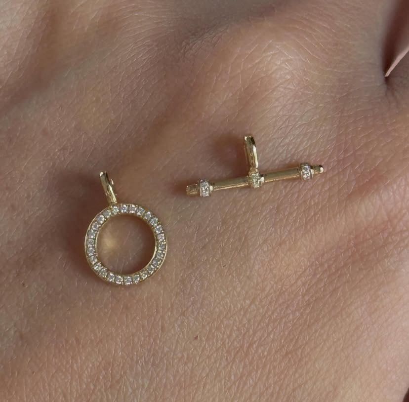 OT pendant (Category: Charms) located in Tiaong. Submitted by sourcedbyhannie (Listing ID 1470534818, Image 1). Description: O and T pendant With universal clasp HK settings Can be used either in necklace or bracelet Can be used multiple ways With natural diamonds (non cert) Accepting 3mos Layaway .