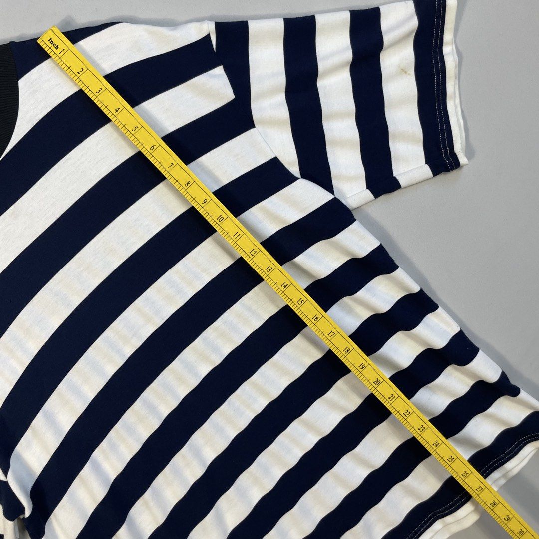 Oversized Horizontal Striped T-Shirt from Gryle Apparel (Category: Tshirts & Polo Shirts ) located in Norzagaray. Submitted by sevenjscloset (Listing ID 1470509749, Image 3). Description: - Brand: Gryle Apparel - Design: Navy and white horizontal stripes (Oversized fit) - Size: Fits Large to XL (Length: 28 inches, Width: 20 inches) - Model Reference: 5'10 and 70kg - Condition: 8.5/10 (No issues).