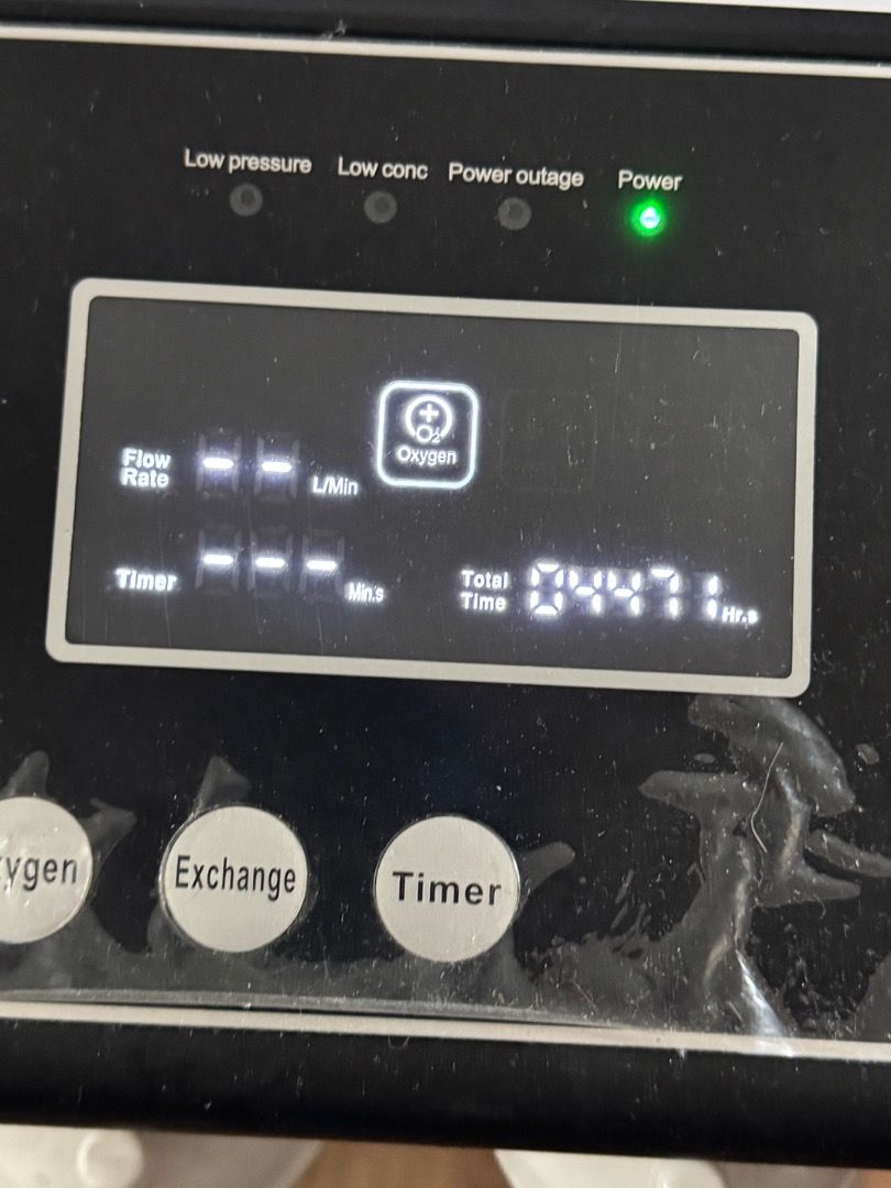 Owgels Oxygen Concentrator 10L Heavy Duty (Category: Medical Supplies & Tools) located in Quezon City. Submitted by roscoe (Listing ID 1470496124, Image 3). Description: - Brand/Model: Owgels Dual Flow Oxygen Concentrator 10L - Color: White and Black - Condition: Powers on with green indicator light, shows standard signs of previous use - Usage: Digital display shows 4,471 total hours - Features: Operational panel for oxygen, exchange, and timer 