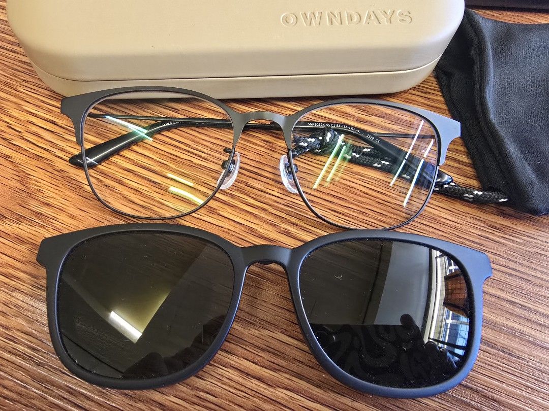 OWNDAYS SNAP Eyeglasses with Sun Lens (Category: Sunglasses & Eyewear) located in Quezon City. Submitted by b.caster (Listing ID 1470368846, Image 2). Description: - LENS replaceable (your own prescription grade) - Brand: OWNDAYS SNAP - Model: SNP1022X-4S C1 - Frame Color: Matte Black - Size: 53-19-142 - Includes magnetic snap-on sunglasses attachment - Comes with original OWNDAYS hard case and black SNAP pouch - Glasses strap attached to the tem