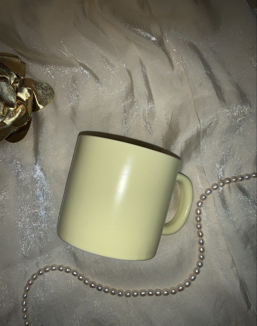 Pale Yellow Ceramic Coffee Mug (Category: Coffee & Tea Tableware) located in Daraga. Submitted by shevvv28 (Listing ID 1470457999, Image 1). Description: - Color: Solid pale yellow - Material: Sturdy ceramic with a modern matte finish - Size: Standard capacity, great for morning coffee or tea - Design: Comfortable curved handle and clean interior - Condition: Excellent, clean, and ready to use.