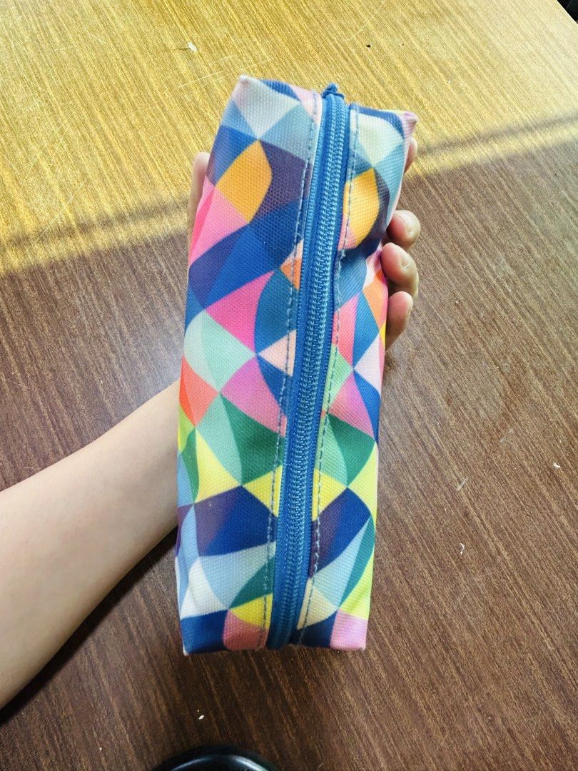 Paperchase Geometric Pattern Pencil Case (Category: Stationery & School Supplies) located in Manila. Submitted by starbalesukandjapansurplus (Listing ID 1470555308, Image 2). Description: - Authentic Paperchase pencil case - Vibrant and trendy geometric polygon pattern - Soft, lightweight fabric material - Roomy interior fits plenty of pens and stationery - Secure blue zip closure with matching blue inner lining - Brand tag stitched inside.