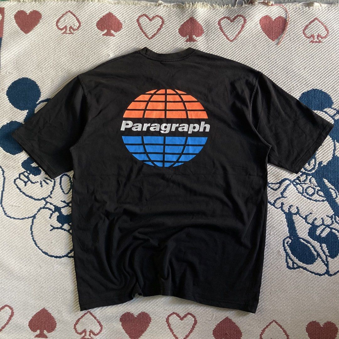 Paragraph Black Globe T-Shirt (Category: Tshirts & Polo Shirts ) located in Tanay. Submitted by marvinbendania (Listing ID 1470436198, Image 1). Description: - Brand: Paragraph - Color: Classic Black - Fit: Short sleeves with a comfortable crew neck - Details: Small globe logo on the left chest; large globe graphic and wordmark on the back - Feature: Distinctive red interior tag - Condition: Brand new / Excellent quality - Perfect for daily casua