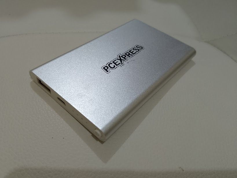 Pc express 5000mAh Power Bank (Category: Batteries & Power Banks) located in Quezon City. Submitted by susmaryosep1 (Listing ID 1470409257, Image 3). Description: Pc express 5000mAh Power Bank - Silver color - Universal use with USB and Micro USB ports - Input: 5V-1000mAh - Output: 5V-1000mAh - Built-in indicator lights - Power button for easy control 400 .