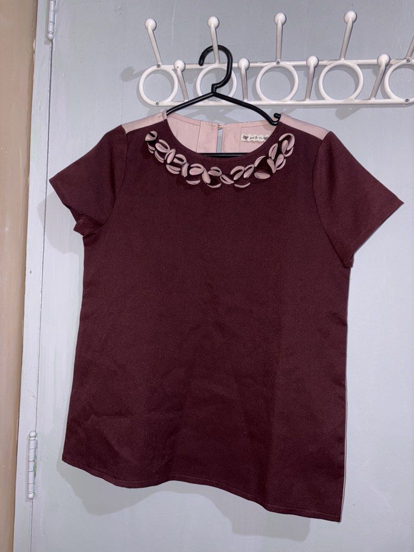 pd & co. Two-Tone Blouse Size S (Category: Blouses) located in Manila. Submitted by margascloset_ (Listing ID 1470467641, Image 1). Description: pd & co. Maroon and Pink blouse small - Details: two tone blouse with layered loop trim along the front neckline - Closure: Button closure at the back keyhole opening - Condition: Clean finish, like new.