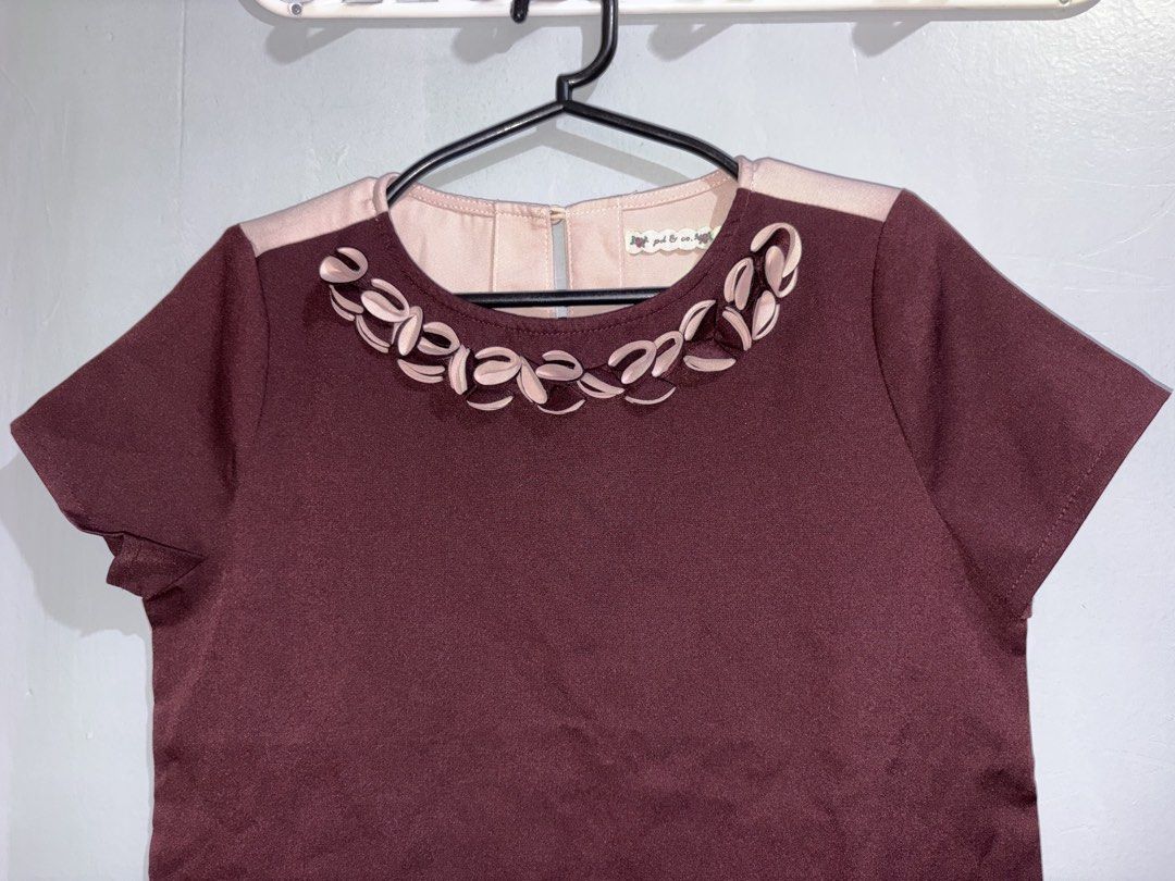 pd & co. Two-Tone Blouse Size S (Category: Blouses) located in Manila. Submitted by margascloset_ (Listing ID 1470467641, Image 2). Description: pd & co. Maroon and Pink blouse small - Details: two tone blouse with layered loop trim along the front neckline - Closure: Button closure at the back keyhole opening - Condition: Clean finish, like new.